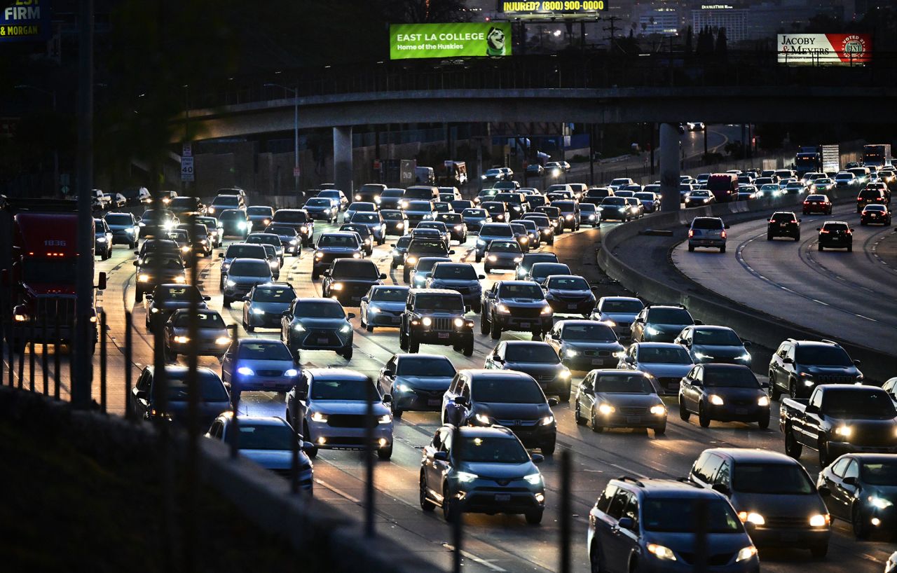 Cars make their way heading east out of Los Angeles during the evening rush hour on January 25, 2024.