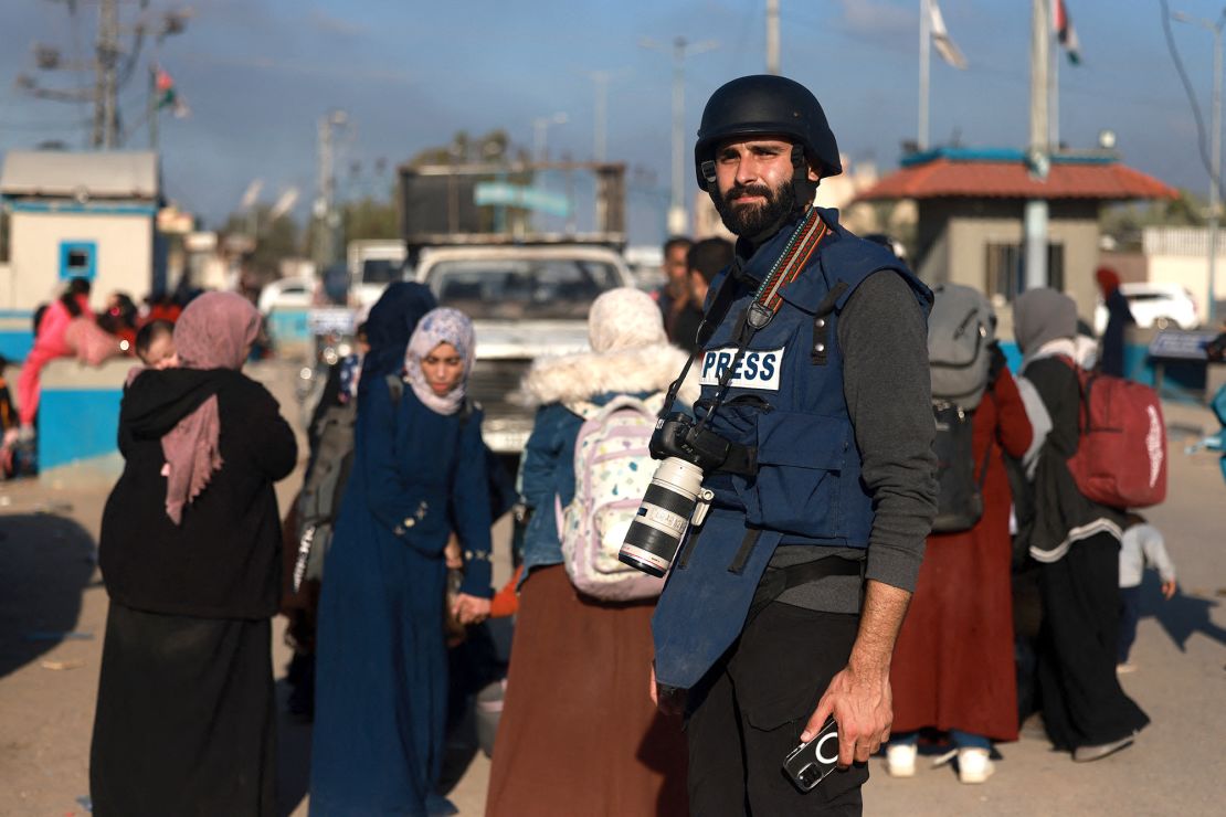 Motaz Azaiza stands in a street in central Gaza on December 18.