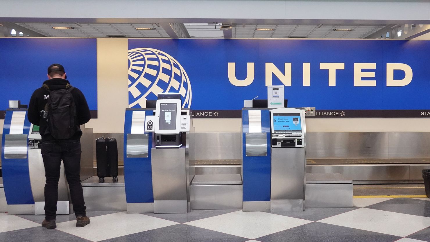 Passengers check in for United Airlines flights at O'Hare International Airport in January. The airline said the grounding of its fleet of Boeing 737 Max 9 jets due to the blowout of a door plug on an Alaska Airlines flight cost it $200 million.