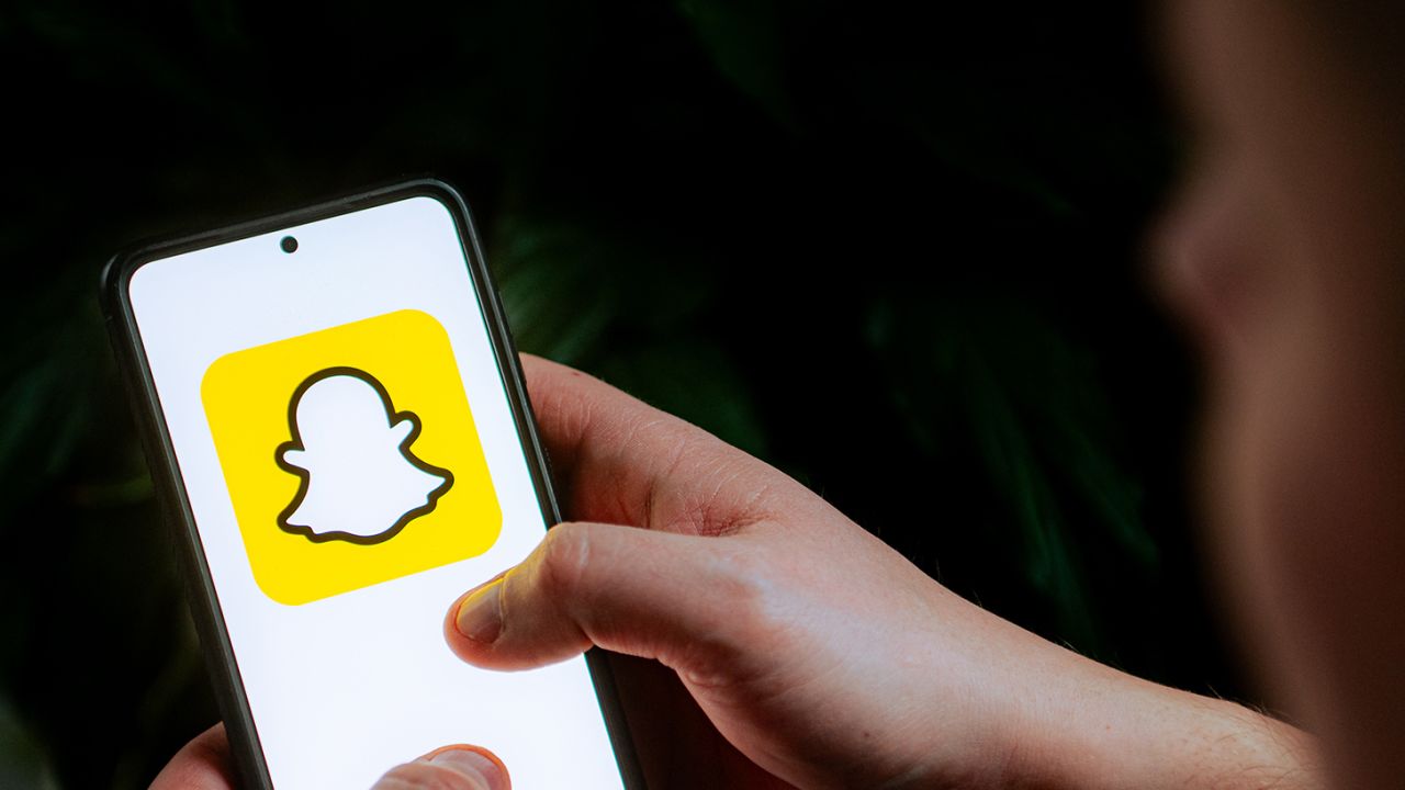 In this photo illustration a Snapchat logo seen displayed on a smartphone.