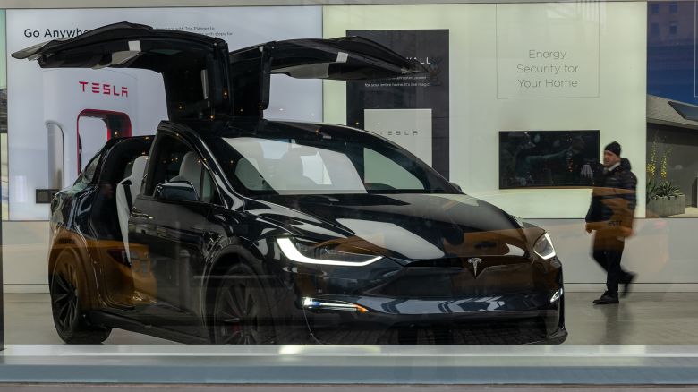 Tesla vehicles are displayed in a Manhattan showroom on January 24, 2024 in New York City. Tesla, the electric car maker, is set to report its fourth-quarter earnings for 2023 after the closing bell Wednesday. Analysts are expecting the company to report earnings of $25.6 billion.