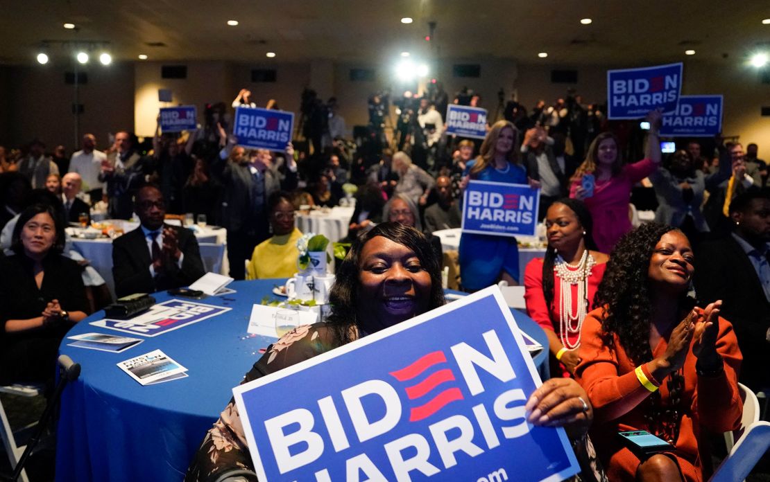Attendees cheer as Biden speaks at a South Carolina Democratic Party event in Columbia on January 27, 2024.