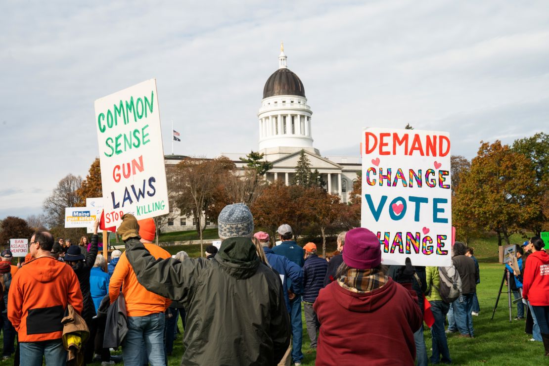 People gather in Augusta at Capitol Park to demand gun safety legislation in Maine on Saturday, November 4, 2023.