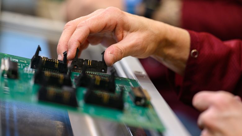 A worker assembles a printed circuit board at the Intervala manufacturing facility in Mount Pleasant, Pennsylvania, US, on Tuesday, Jan. 30, 2024. The US Census Bureau is scheduled to release factory orders figures on February 2. Photographer: Justin Merriman/Bloomberg via Getty Images
