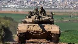 topshot - an israeli army battle tank moves at a position along the border between southern israeli and the gaza strip on january 31, 2024 amid the ongoing conflict between israel and the palestinian militant group hamas. (photo by jack guez / afp) (photo by jack guez/afp via getty images)
