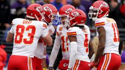 BALTIMORE, MARYLAND - JANUARY 28: Travis Kelce #87 of the Kansas City Chiefs celebrates with Patrick Mahomes #15 and teammates after a touchdown pass against the Baltimore Ravens during the first quarter in the AFC Championship Game at M&T Bank Stadium on January 28, 2024 in Baltimore, Maryland. (Photo by Rob Carr/Getty Images)