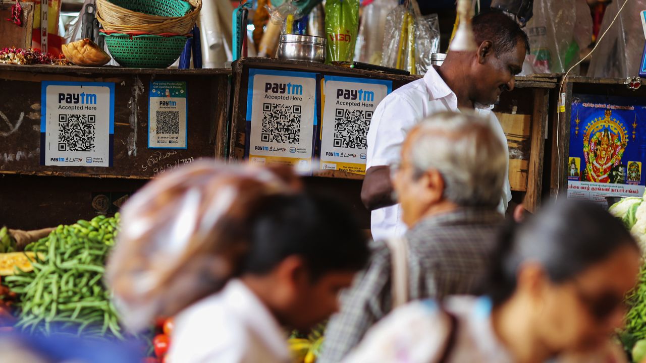 QR codes for the Paytm digital payment system at a roadside vegetables stall in Mumbai, India.