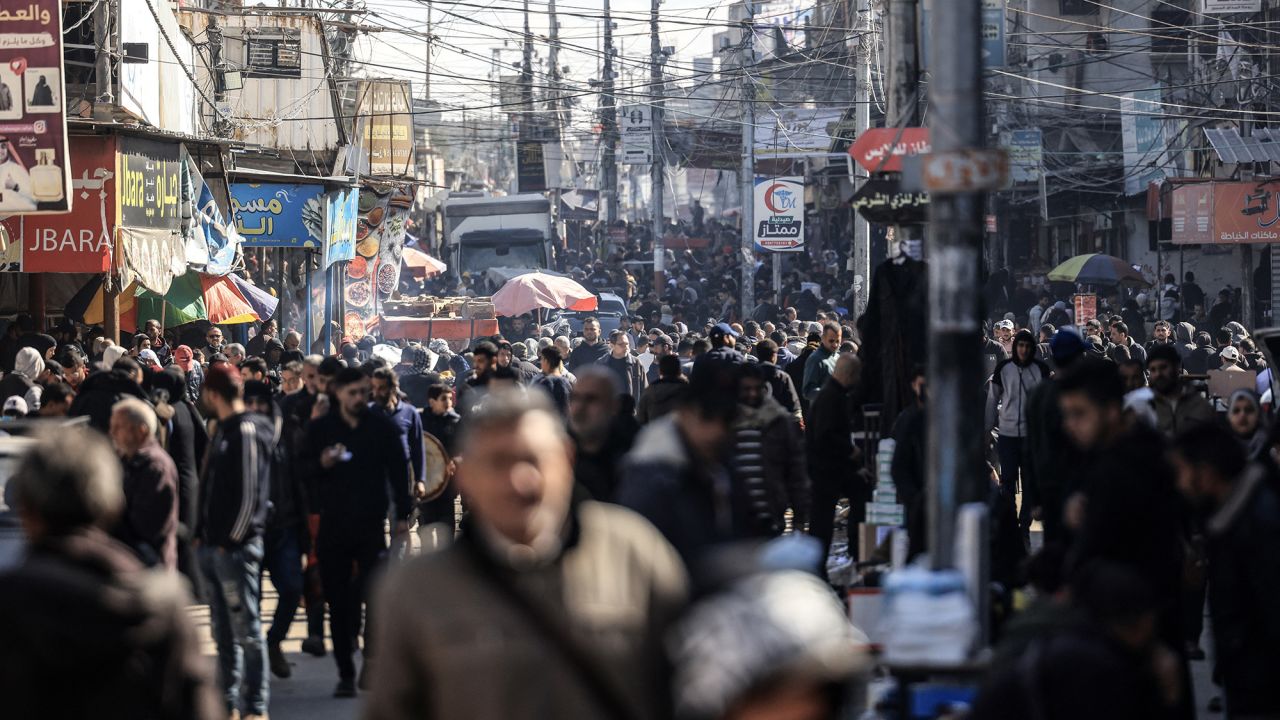 People who fled fighting in the Gaza Strip gather along an overcrowded street in Rafah in the southern part of the Palestinian territory on February 1, 2024, as battles between Israel and the militant group Hamas continue. (Photo by Mahmud Hams / AFP) (Photo by MAHMUD HAMS/AFP via Getty Images)