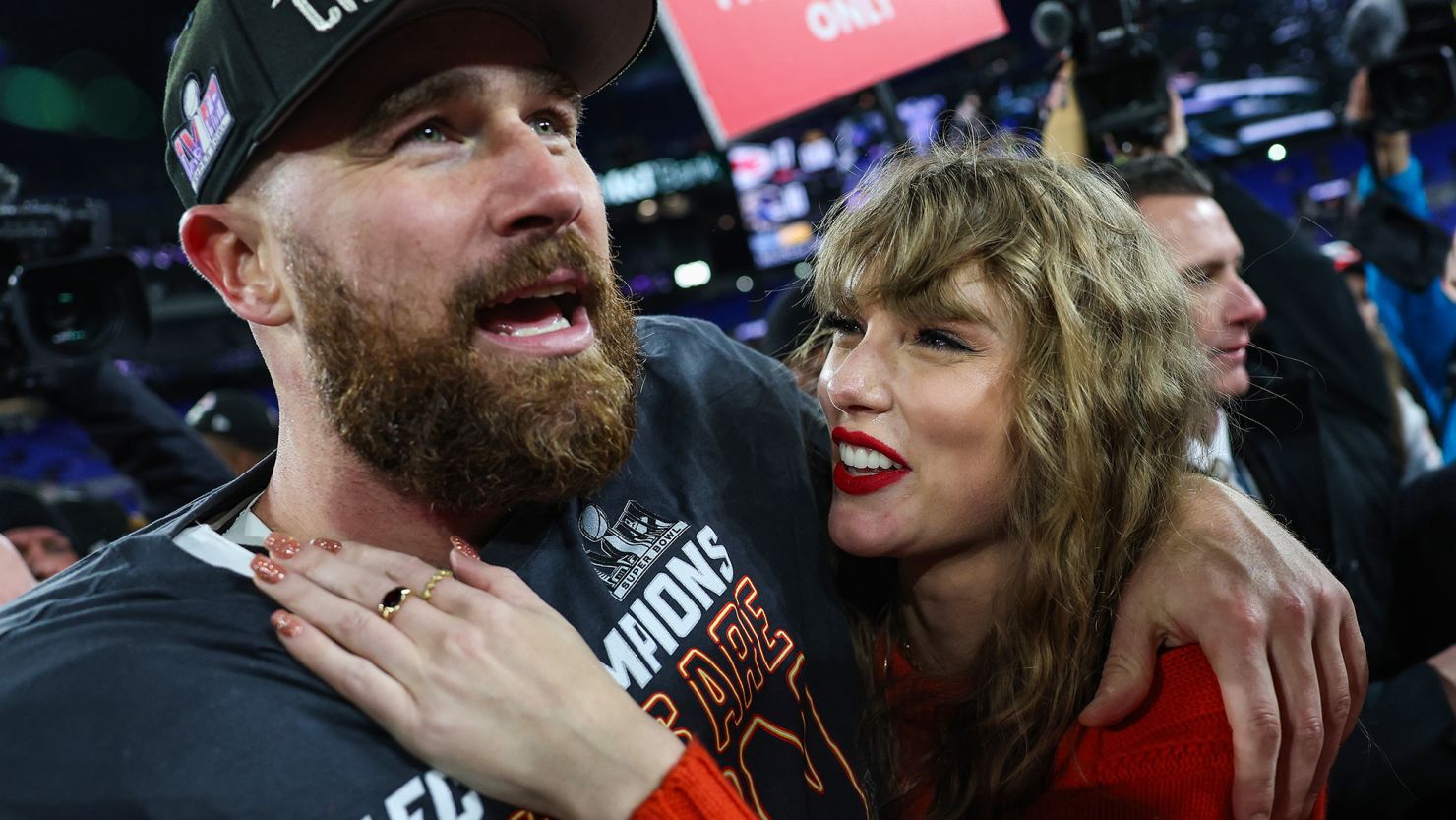 Travis Kelce of the Kansas City Chiefs celebrates with Taylor Swift on Jan. 28.