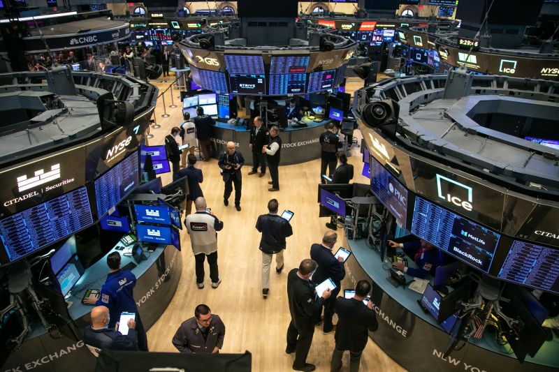 Traders work on the floor of the New York Stock Exchange in New York, the United States, on Jan. 31, 2024.