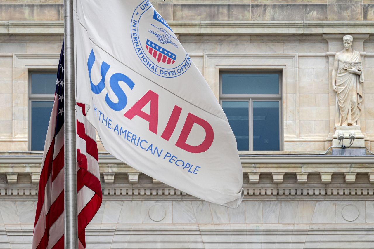 The US Agency of International Development (USAID) flag flies outside the agency's headquarters building in Washington, DC, on January 30, 2024.