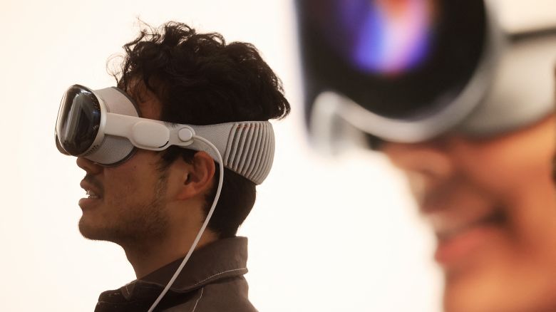 A customer tries his Vision Pro at the launch of the Apple Vision Pro at Apple The Grove in Los Angeles, California, on February 2, 2024. The Vision Pro, the tech giant's $3,499 headset, is its first major release since the Apple Watch nine years ago.