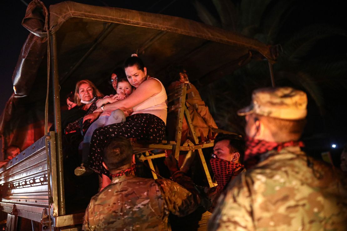 Residents being evacuated by the military in Valparaiso, Chile.