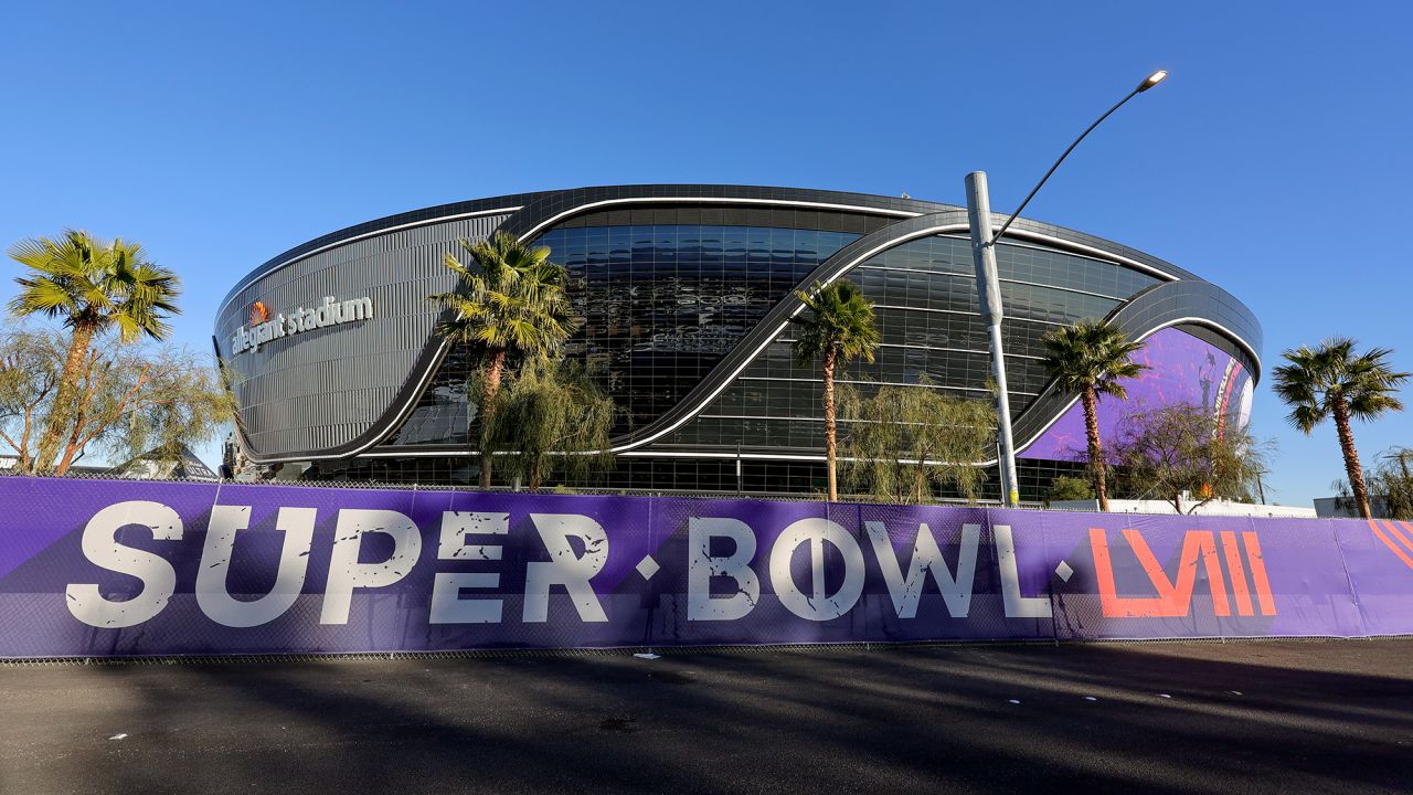 An exterior view shows signage for Super Bowl LVIII on fencing around Allegiant Stadium on January 30, 2024 in Las Vegas, Nevada. The game will be played on February 11, 2024, between the Kansas City Chiefs and the San Francisco 49ers.