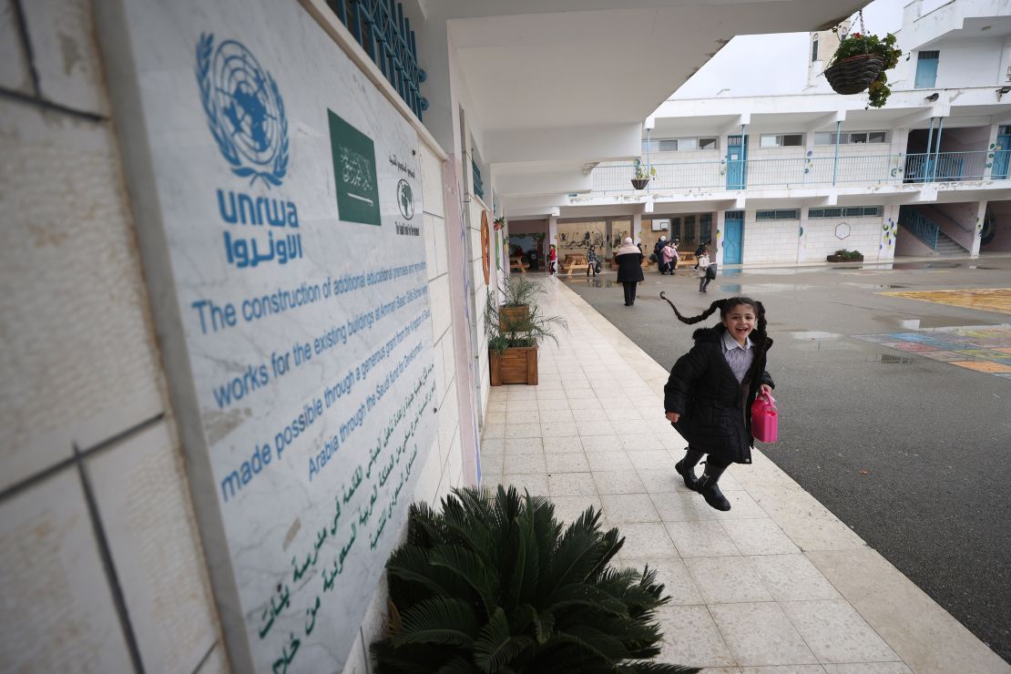 RAMALLAH, WEST BANK - FEBRUARY 03: A Palestinian student walks out of a UNRWA school with a lunchbox in her hand at al-Am'ari Refugee Camp after funding cuts to UNRWA in Ramallah, West Bank on February 03, 2024. Last week, countries such as the United States, Canada, Australia, Germany, Italy, and Japan suspended their financial aid to the agency in light of Tel Aviv's allegation without clarifying the fate of their decision or the possibility of retracting it. The agency is funded almost entirely through voluntary contributions from government donors and the European Union. According to the list of aid for 2022 published by the agency, the United States is considered the largest supporter of UNRWA, followed by Germany, then Sweden in fourth place, followed by Japan in fifth. (Photo by Issam Rimawi/Anadolu via Getty Images)