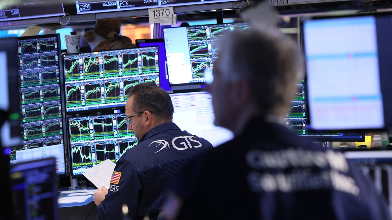 Traders work on the floor of the New York Stock Exchange during morning trading on January 31, 2024 in New York City.