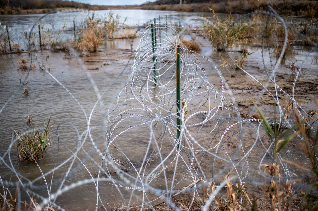 Razor wire is seen near the Rio Grande on February 3, 2024 at Shelby Park in Eagle Pass, Texas.