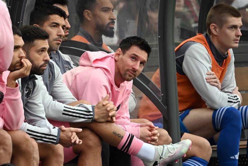 Inter Miami's Argentine forward Lionel Messi (C) sits on the bench during the friendly football match between Hong Kong XI and US Inter Miami CF in Hong Kong on February 4, 2024.