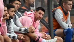 Inter Miami's Argentine forward Lionel Messi (C) sits on the bench during the friendly football match between Hong Kong XI and US Inter Miami CF in Hong Kong on February 4, 2024.