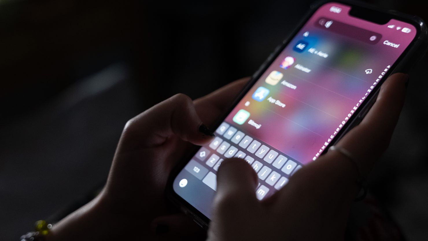 In this photo illustration, a teenager uses her mobile phone to access social media. New York is the first state to pass a law regulating social media algorithms amid nationwide allegations that apps such as Instagram or TikTok have hooked users with addictive features.