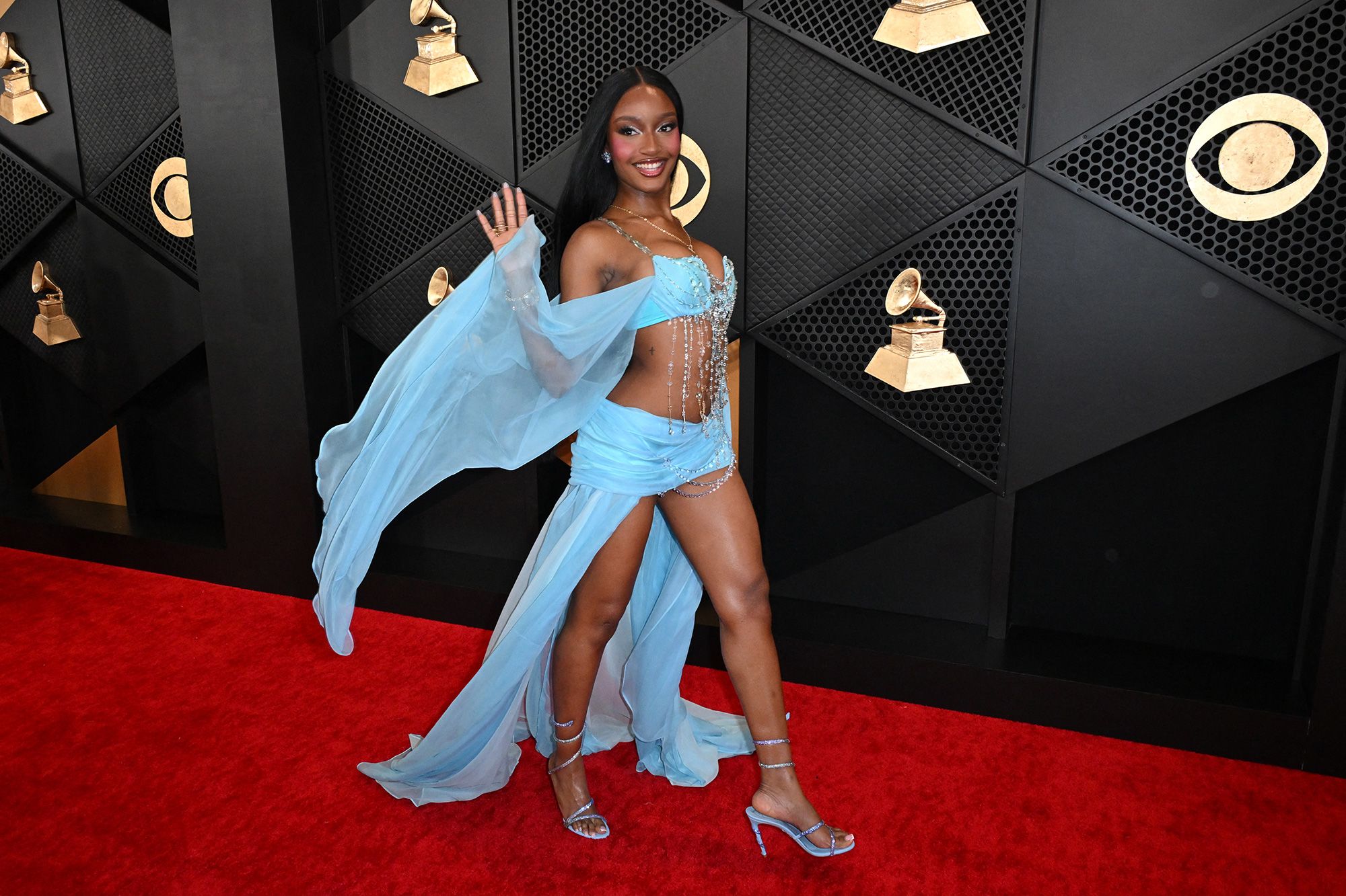 Ayra Starr, nominated for Best African Music Performance, brought some color to the red carpet in this breezy sky-blue number.