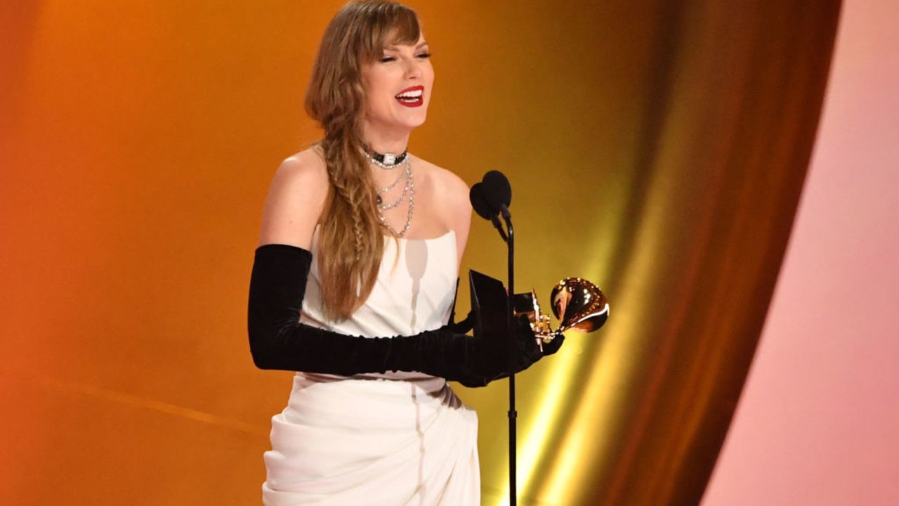 US singer-songwriter Taylor Swift accepts the Best Pop Vocal Album award for "Midnights" on stage during the 66th Annual Grammy Awards at the Crypto.com Arena in Los Angeles on February 4, 2024. (Photo by Valerie Macon / AFP) (Photo by VALERIE MACON/AFP via Getty Images)