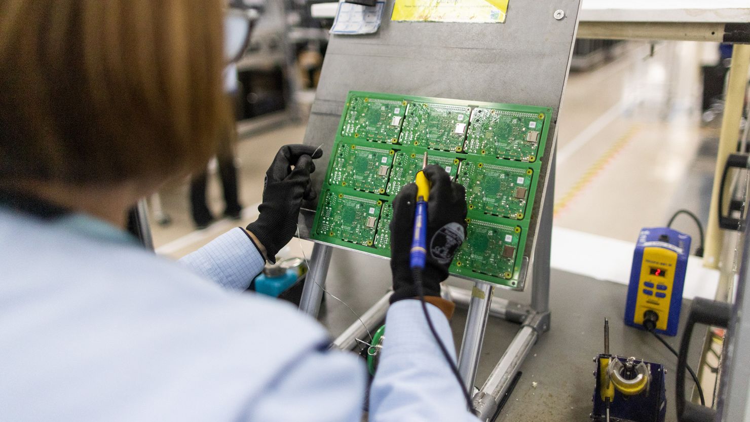 An employee performs quality control checks on Raspberry Pi computers at the Sony UK Technology Centre in Wales in February 2024.