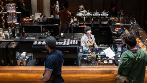 People work at a Starbucks in Manhattan on February 02, 2024 in New York City.