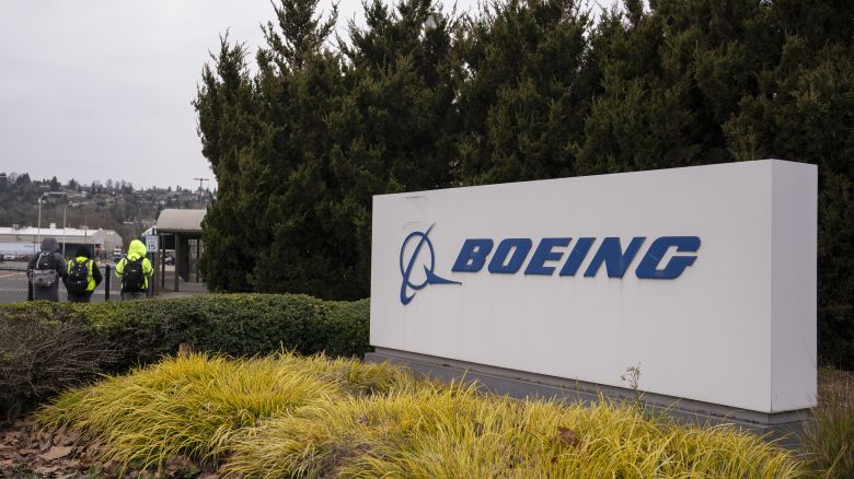 Signage outside the Boeing Co. manufacturing facility in Renton, Washington, US, on Monday, Feb. 5, 2024. Boeing Co. found more mistakes with holes drilled in the fuselage of its 737 Max jet, a setback that could further slow deliveries on a critical program already restricted by regulators over quality lapses. Photographer: David Ryder/Bloomberg via Getty Images