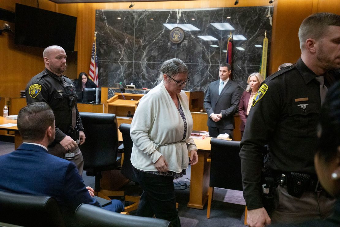 Jennifer Crumbley exits from the courtroom in shackles on Tuesday after her guilty verdict.