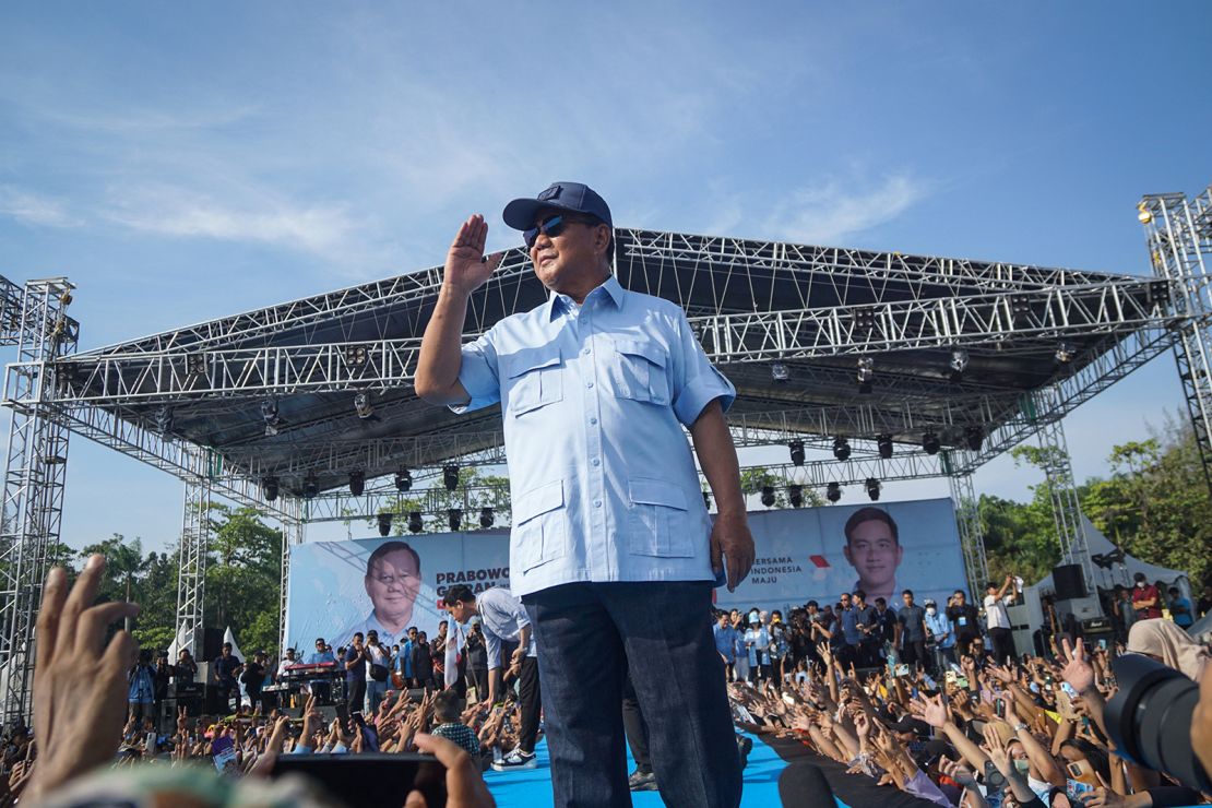 Presidential frontrunner Prabowo Subianto greets the crowds at a rally at the Baharuddin Siregar stadium in Lubuk Pakam, North Sumatra on February 7, 2024.