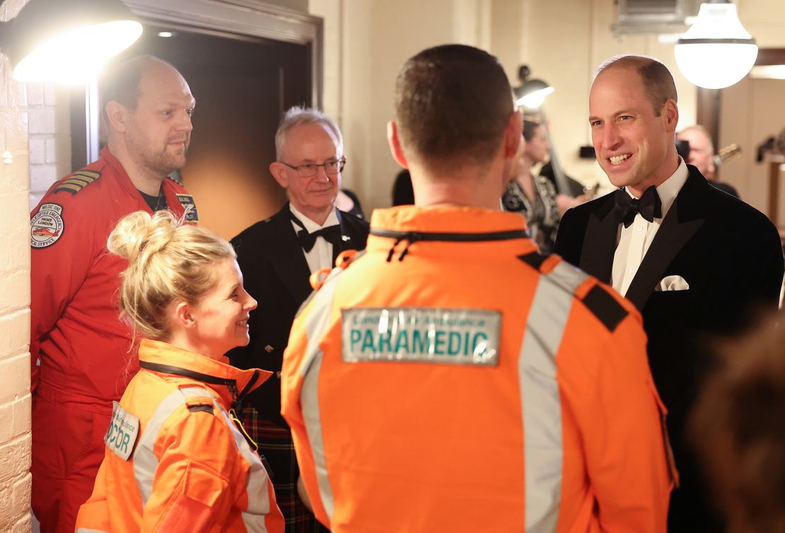 William chats with with Air Ambulance pilots, doctors and paramedics on Wednesday evening.