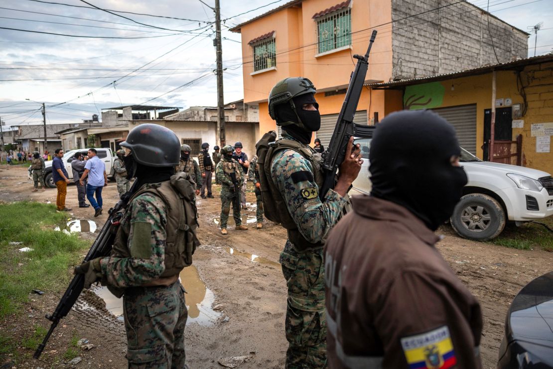 Ecuadorian soldiers search a neighborhood for illegal weapons during an anti-gang operation in Guayaquil on February 5.