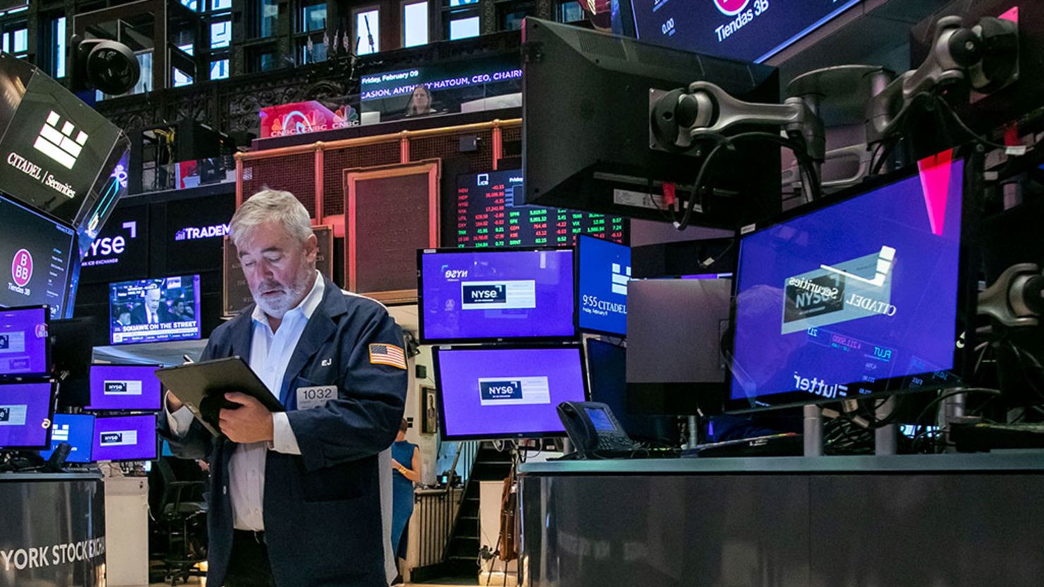 A trader works on the floor of the New York Stock Exchange (NYSE) in New York, US, on Friday, Feb. 9, 2024.