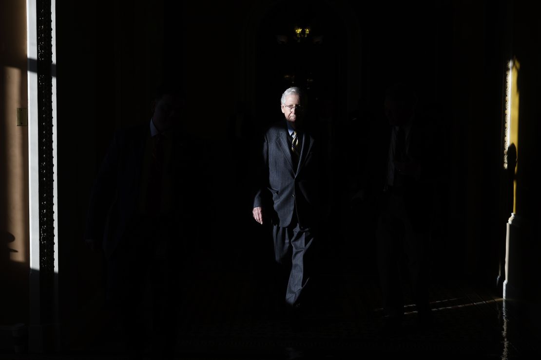 Senate Minority Leader Mitch McConnell returns to his office in the US Capitol following a procedural vote on February 7, 2024 in Washington, DC.