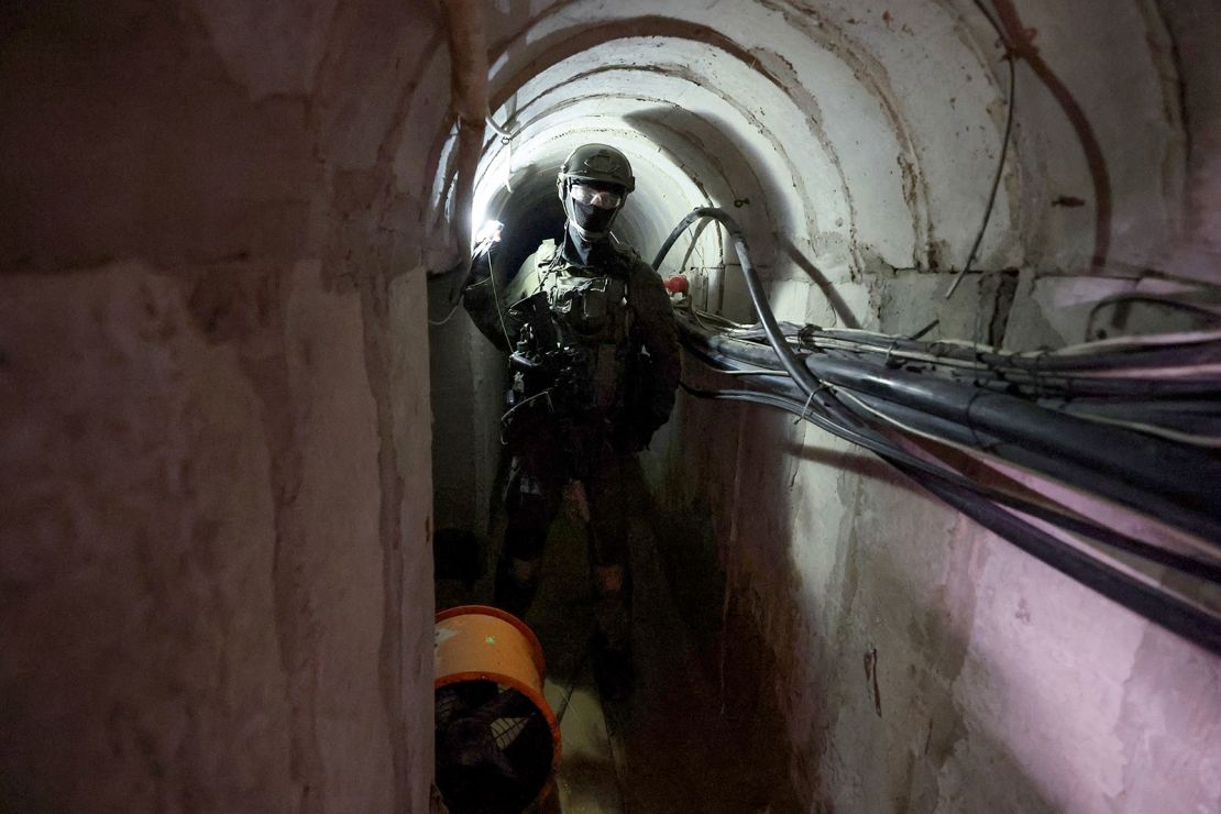 An Israeli soldier is pictured inside a tunnel that the Israeli military claimed is a "Hamas command tunnel" under a compound of the United Nations Relief and Works Agency for Palestine Refugees (UNRWA) in Gaza City.