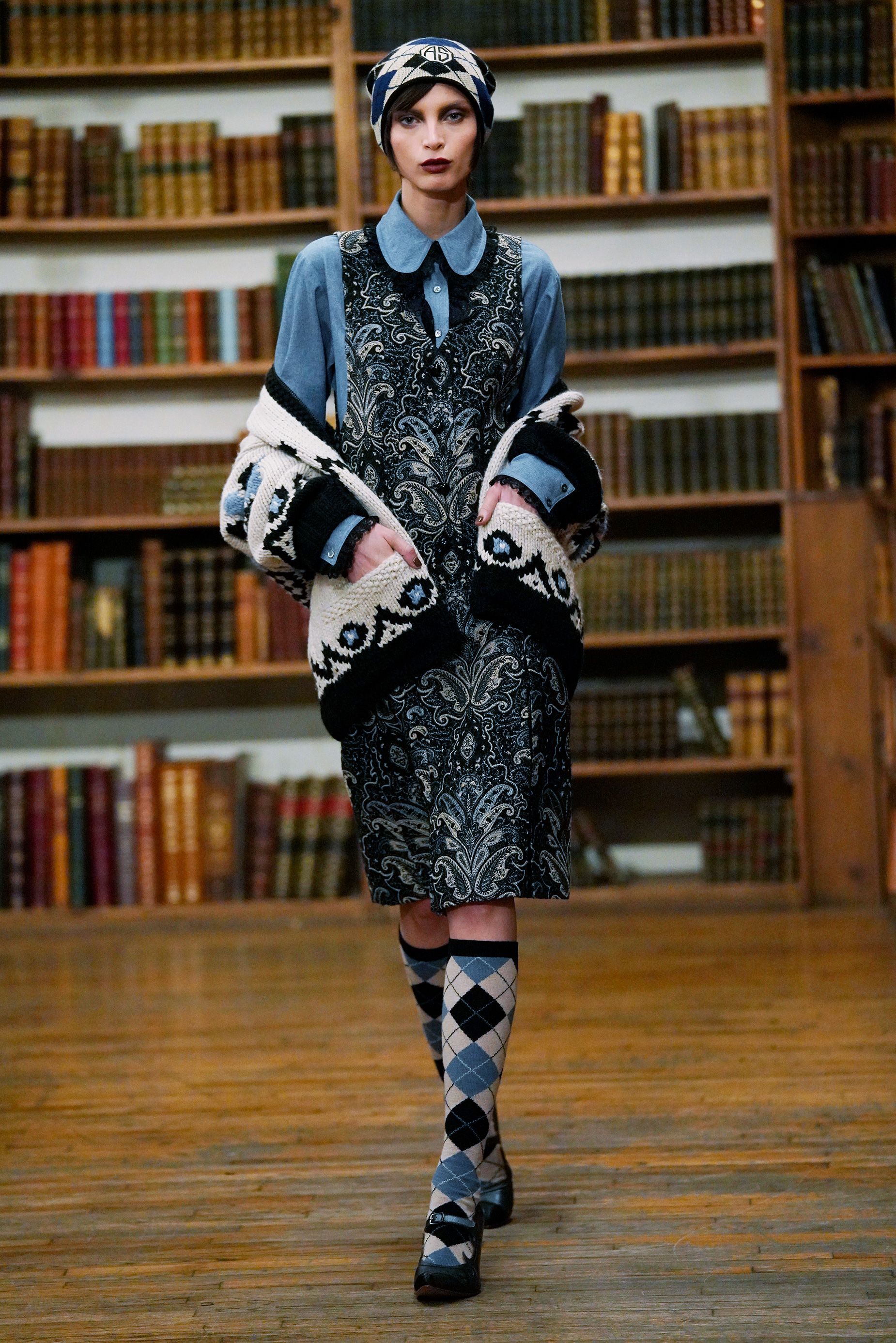 Anna Sui presented her collection in New York City's famed Strand Book Store, with a runway amid the stacks.