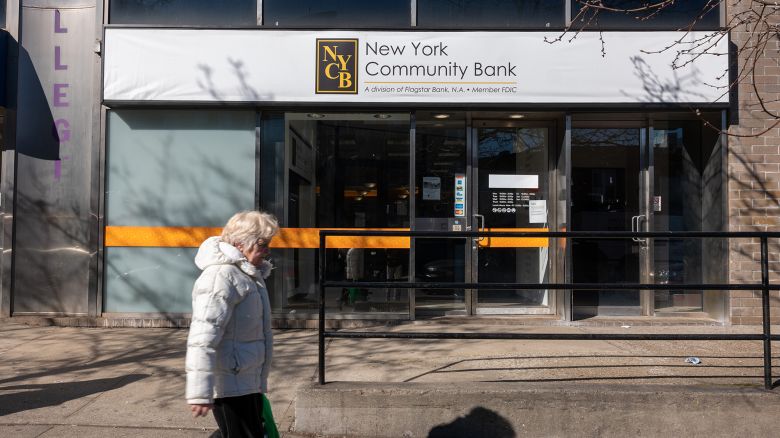 A New York Community Bank stands in Brooklyn on February 08, 2024 in New York City. New York Community Bancorp, a regional lender, shed about 60% of its value over the past eight days and its credit rating has been downgraded to Junk by Moody's.