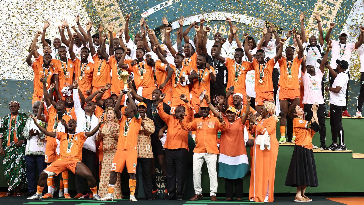 Ivory Coast players and staff celebrate winning the AFCON title.