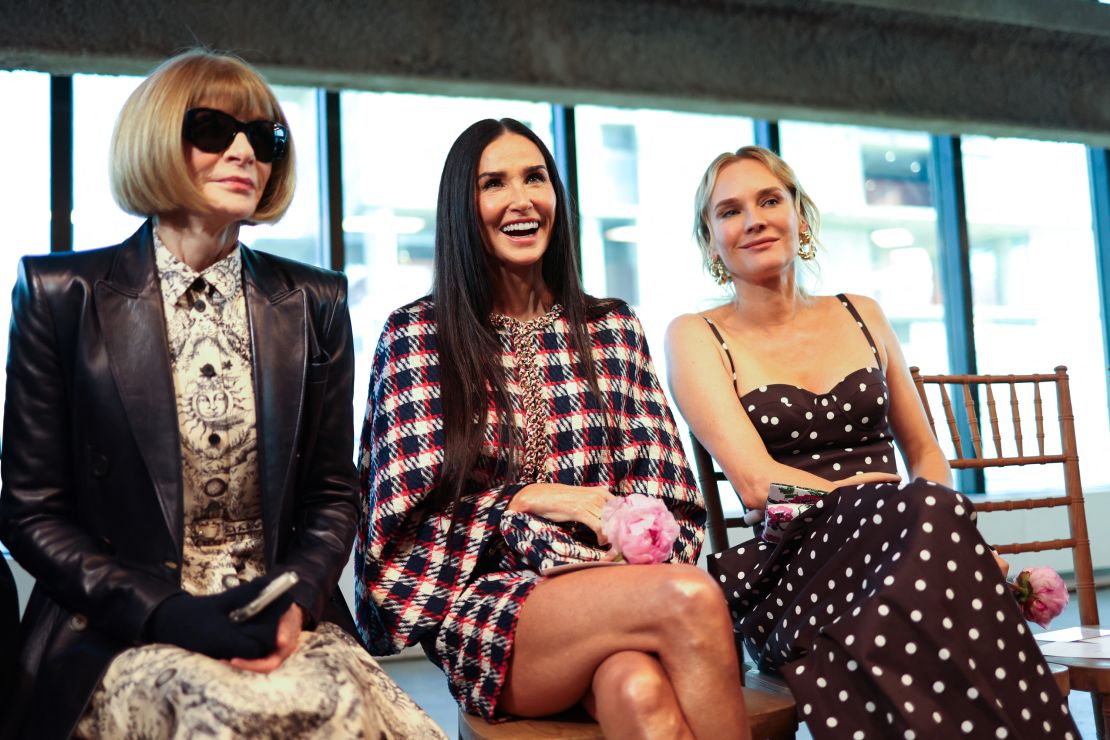 Anna Wintour, Demi Moore and Diane Kruger attend the Carolina Herrera runway show on February 12.