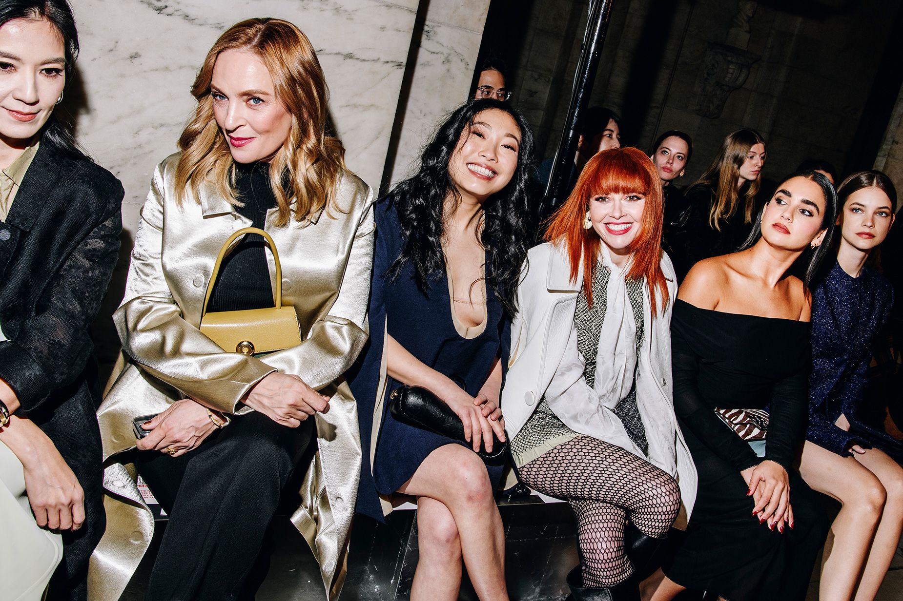 Uma Thurman, Awkwafina, Natasha Lyonne and Geraldine Viswanathan wait on the Tory Burch runway demonstrate, held at the Original York Public Library on February 12.