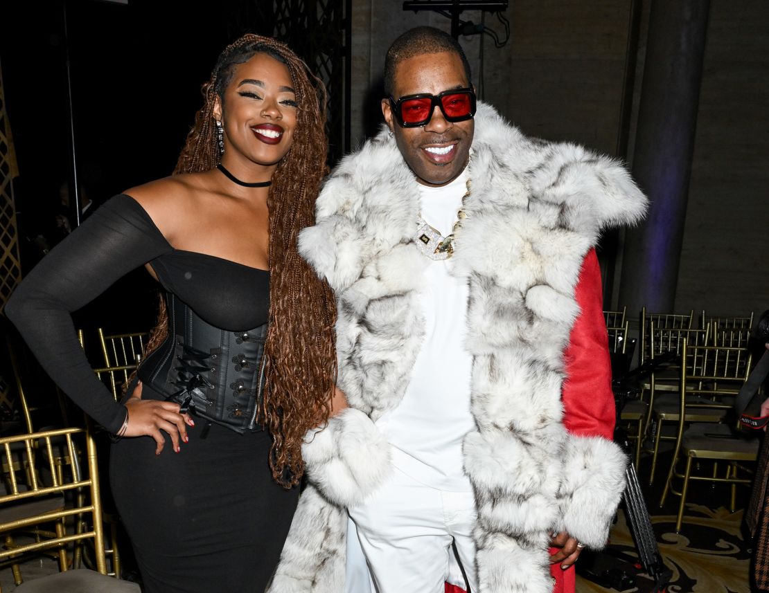 Cacie Smith and Busta Rhymes at LaQuan Smith.