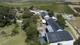 An aerial view of the newly-installed solar panels at Ayama Winery on February 4, 2024 near Windmeul in the Western Cape Province of South Africa. The Cape's wineries are facing a challenging harvest amid extreme summer temperatures reaching into the mid-40 degrees C and threats of wildfires fueled by the hot temperatures and strong winds.