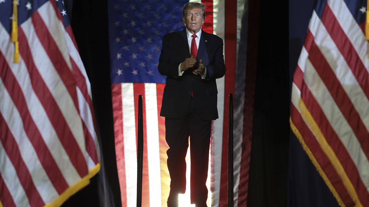 CONWAY, SOUTH CAROLINA - FEBRUARY 10: Republican presidential candidate and former President Donald Trump arrives on stage during a Get Out The Vote rally at Coastal Carolina University on February 10, 2024 in Conway, South Carolina. South Carolina holds its Republican primary on February 24. (Photo by Win McNamee/Getty Images)