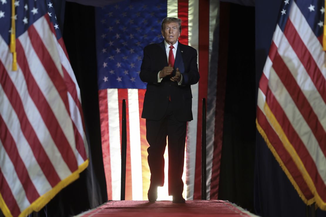 Former President Donald Trump arrives on stage during a Get Out The Vote rally at Coastal Carolina University on February 10 in Conway, South Carolina.