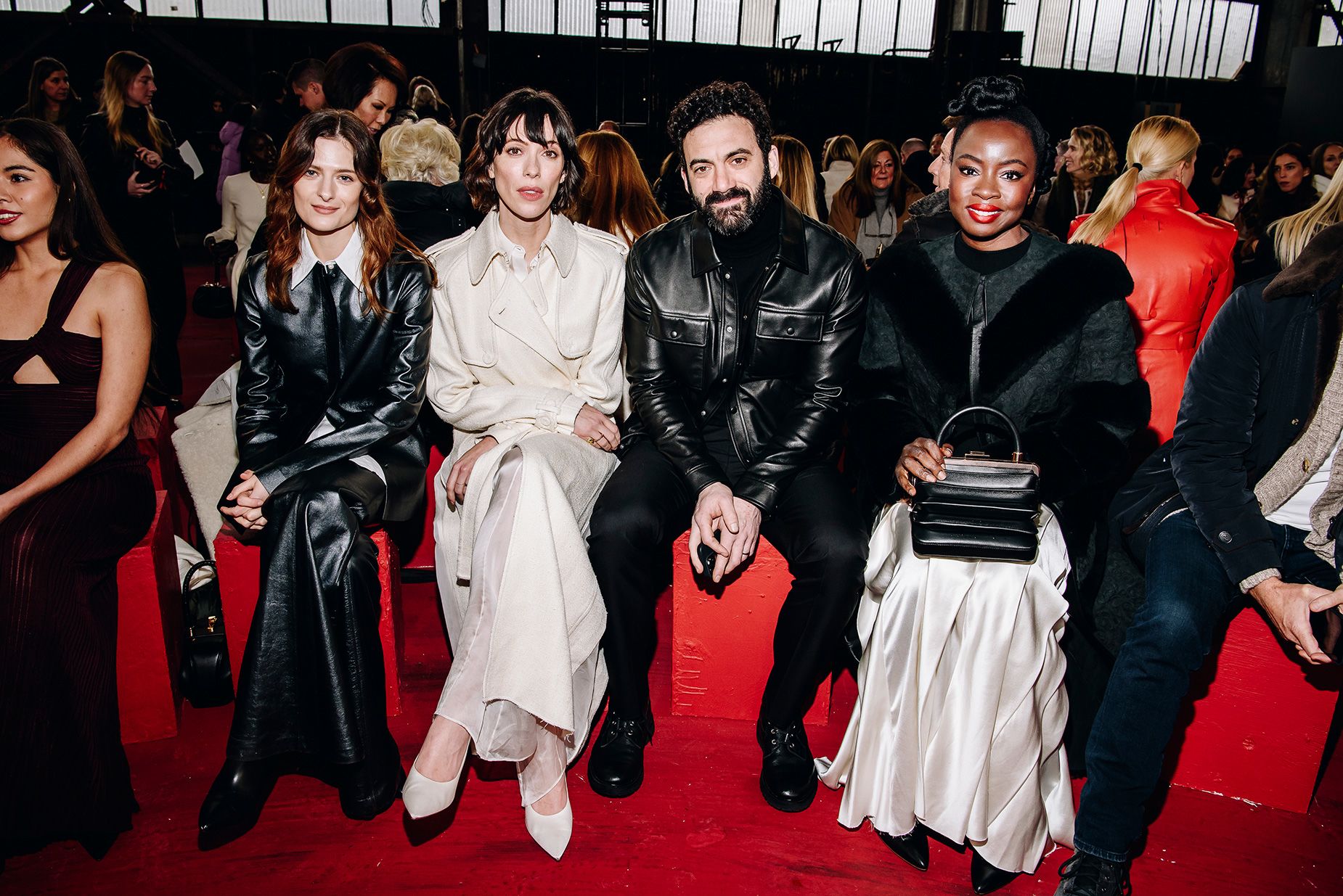 Louisa Jacobson, Rebecca Hall, Morgan Spector and Danai Gurira wait on the Gabriela Hearst runway demonstrate in Brooklyn on February 13.