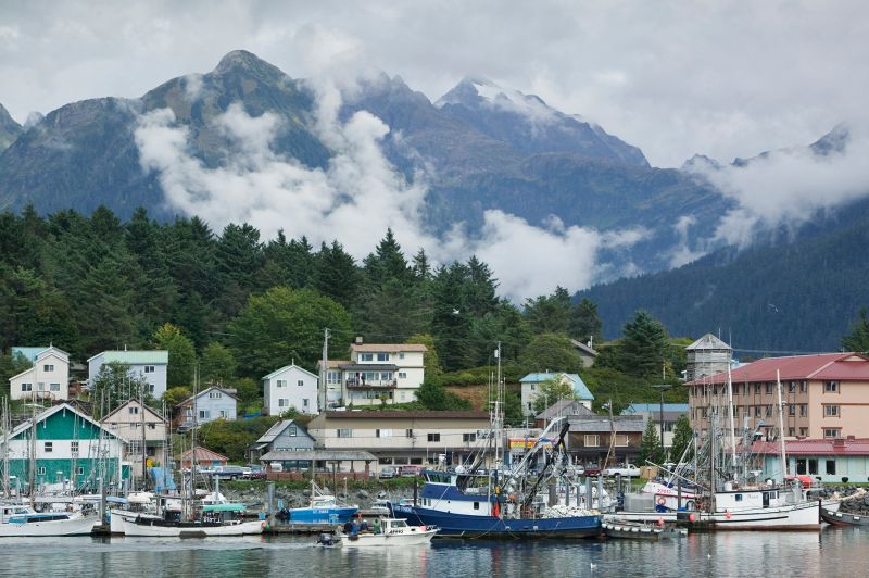 Alaska: Instead of offering cash to potential residents out of state, Alaska provides those already within its borders with a yearly sum from its Permanent Fund Dividend. The southeastern city of Sitka is pictured.