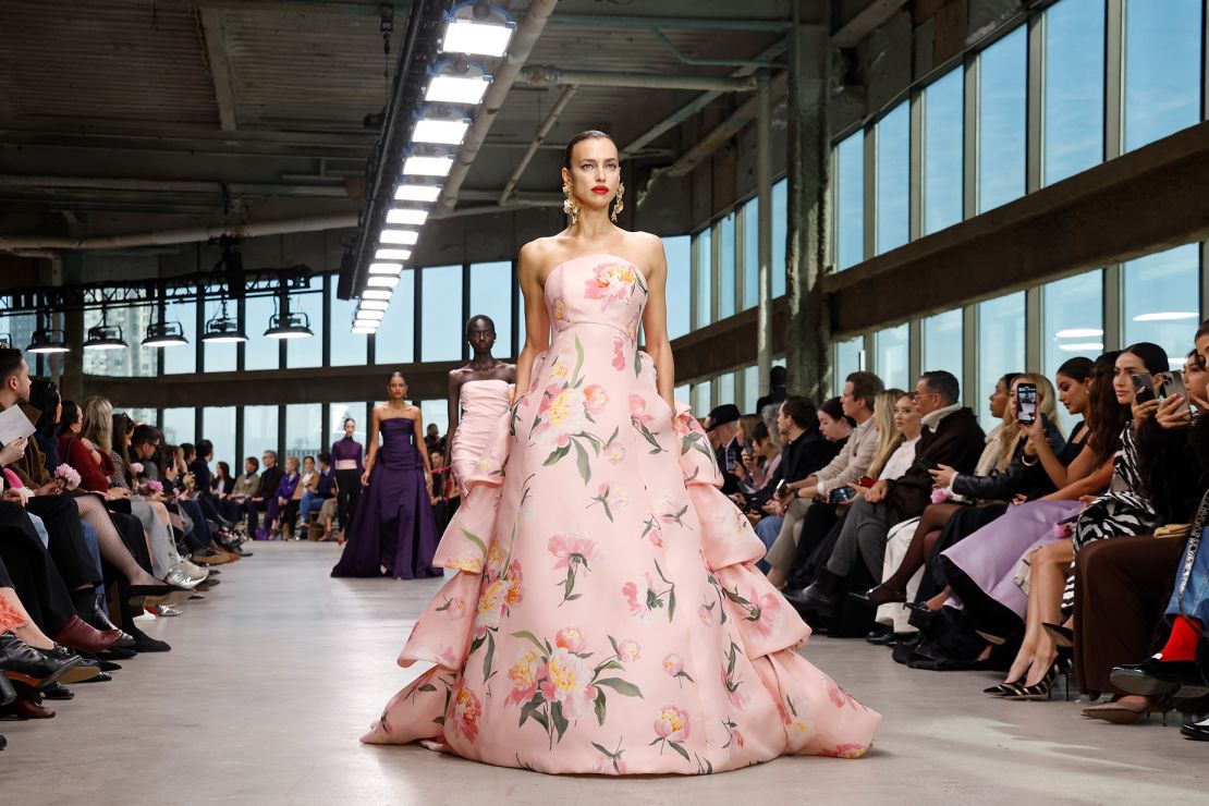 Irina Shayk wore a voluminous pink gown on the runway, one of many floral looks in full bloom.