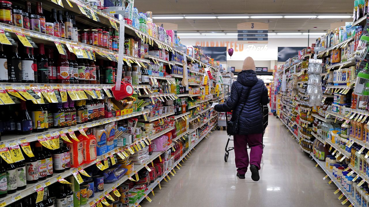 A customer shops at a grocery store on February 13, 2024 in Chicago, Illinois.
