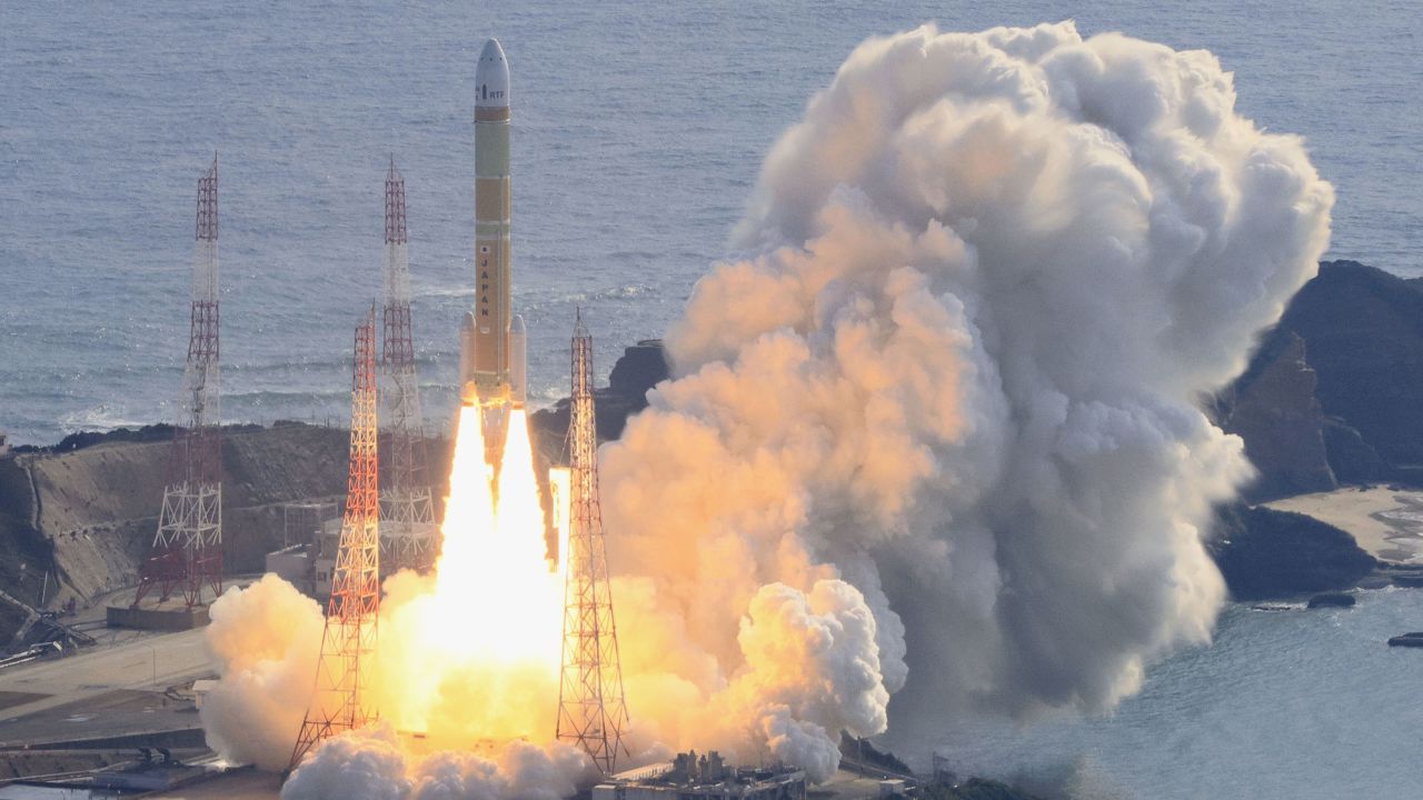 Photo taken from a Kyodo News helicopter on Feb. 17, 2024, shows Japan's No. 2 H3 rocket carrying a dummy satellite and two functioning microsatellites lifting off from the Tanegashima Space Center in Minamitane, Kagoshima Prefecture, southwestern Japan. (Photo by Kyodo News via Getty Images)